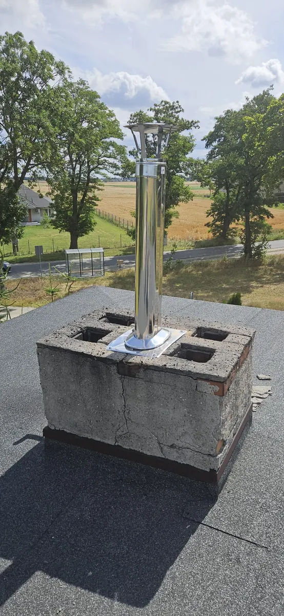 Montaż wkładu kominowego na dachu — No Limits Energy